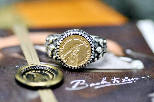 Hand Holding Feather Pen Latin Motto Fleur De Lis Signet Ring - Backtozero B20 - 12f, 12mm, 12mm ring, 925 Silver, accessory, Fleur de Lis, him, Intaglio, Intaglio ring, jewelry, knowledge, latin, latin motto, learn, Message, ring, seal, seal ring, signet, size 10, size 11, size 8, size 9, wax seal, wax seal stamp, wisdom