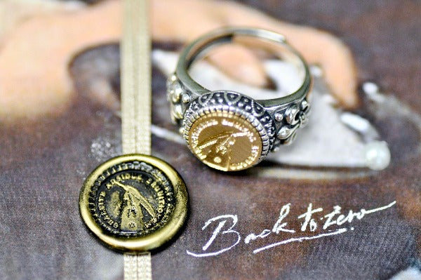 Hand Holding Feather Pen Latin Motto Fleur De Lis Signet Ring - Backtozero B20 - 12f, 12mm, 12mm ring, 925 Silver, accessory, Fleur de Lis, him, Intaglio, Intaglio ring, jewelry, knowledge, latin, latin motto, learn, Message, ring, seal, seal ring, signet, size 10, size 11, size 8, size 9, wax seal, wax seal stamp, wisdom
