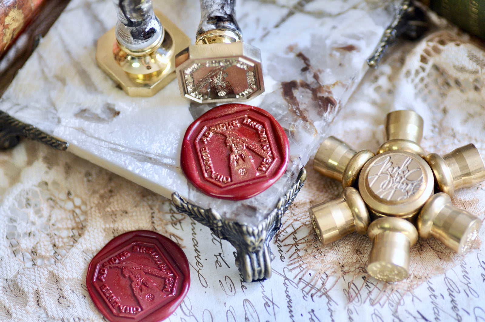 Hand holding Leather Pen Latin Motto Wax Seal Stamp | Wisdom | O