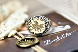 Winged Ox Latin Motto Lace Signet Ring