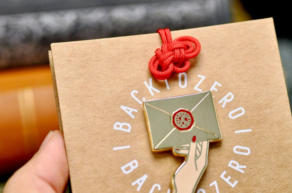 Hand Holding Wax Seal Letter Enamel Pin | Gold - Backtozero B20 - enamel, Gold, hand, hand gesture, hard enamel, hard enamel pin, her, hold, holding, lapel, Letter, Letters, love letter, mail, metal, metal pin, pin, Red, wax seal