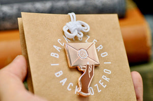 Hand Holding Wax Seal Letter Enamel Pin | Rose Gold
