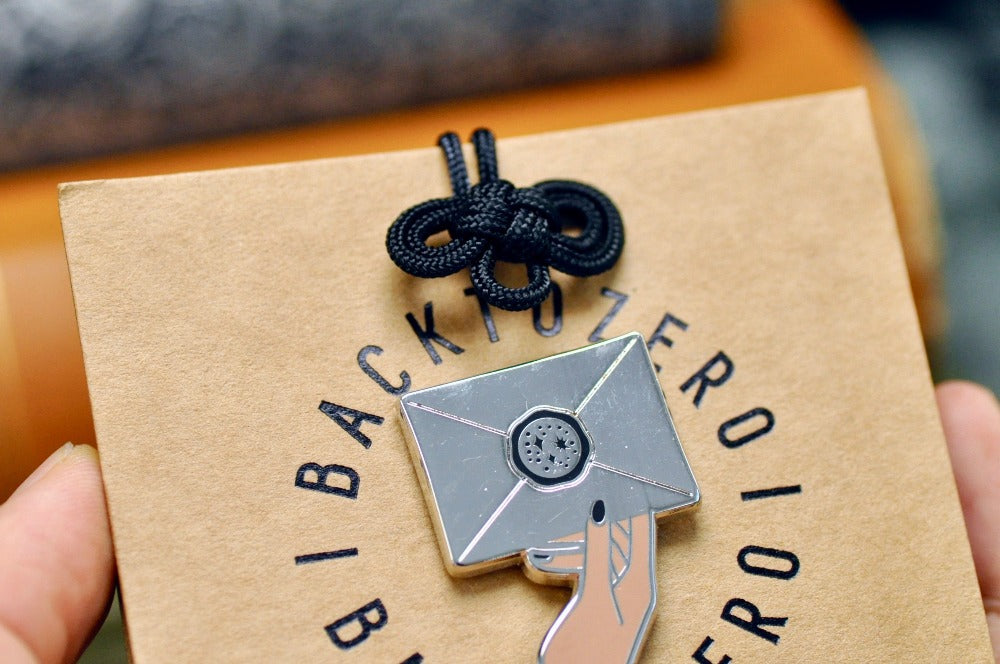 Hand Holding Wax Seal Letter Enamel Pin | Silver - Backtozero B20 - Black, enamel, hand, hand gesture, hard enamel, hard enamel pin, her, hold, holding, lapel, Letter, Letters, love letter, mail, metal, metal pin, pin, Silver, wax seal