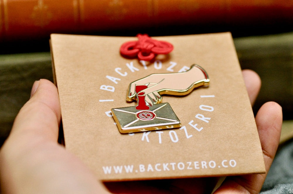 Hand Pressing Wax Seal Letter Enamel Pin | Gold - Backtozero B20 - enamel, Gold, hand, hand gesture, hard enamel, hard enamel pin, her, lapel, Letter, Letters, love letter, mail, metal, metal pin, pin, press, Red, wax seal