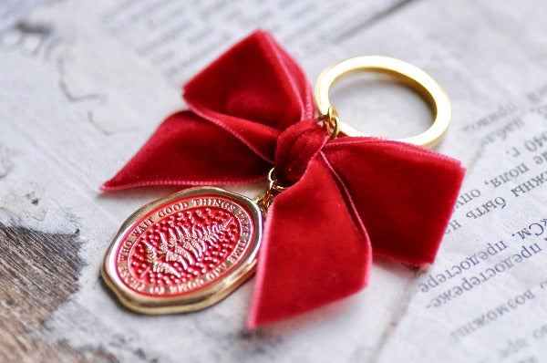 Message Wax Seal Keychain Red Bow | Fern - Backtozero B20 - botanic, Botanical, bow, charm, Come to those who wait, enamel, enamel keychain, fern, Good things take time, her, keychain, lapel, metal, Nature, Plant, plants, Red, ribbon, soft enamel, starry, velvet, wax seal