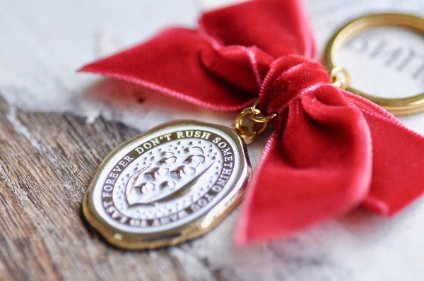 Message Wax Seal Keychain Red Bow | Lily of the Valley - Backtozero B20 - botanic, Botanical, bow, charm, enamel, enamel keychain, Flower, her, keychain, lapel, lily of the valley, metal, Nature, Plant, plants, Red, ribbon, soft enamel, starry, velvet, wax seal