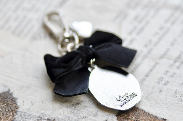 Message Wax Seal Charm Keychain Black Bow & Heart | Lily of the Valley - Backtozero B20 - bow, charm, enamel, enamel keychain, Flower, heart, her, keychain, lapel, lily of the valley, metal, ribbon, seashell, soft enamel, starry, velvet, wax seal