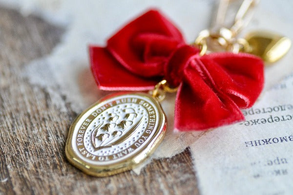 Message Wax Seal Charm Keychain Red Bow & Heart | Lily of the Valley - Backtozero B20 - botanic, Botanical, bow, charm, enamel, enamel keychain, Flower, Heart, her, keychain, lapel, lily of the valley, metal, Nature, Plant, plants, Red, ribbon, soft enamel, starry, velvet, wax seal