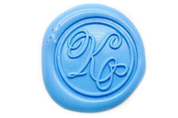 Suzanne Cunningham Calligraphy K Wax Seal Stamp | Available in 4 Sizes - Backtozero B20 - 1 initial, 1.2cm, 1initial, Calligraphy, collaboration, mini, Monogram, One initial, Pastel Blue, Personalized, signature, signaturehandle, Suzanne Cunningham, tiny