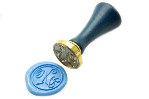 Suzanne Cunningham Calligraphy K Wax Seal Stamp | Available in 4 Sizes - Backtozero B20 - 1 initial, 1.2cm, 1initial, Calligraphy, collaboration, mini, Monogram, One initial, Pastel Blue, Personalized, signature, signaturehandle, Suzanne Cunningham, tiny
