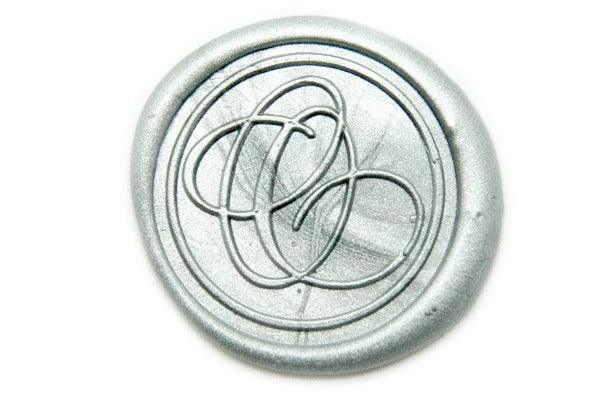 Suzanne Cunningham Calligraphy O Wax Seal Stamp | Available in 4 Sizes - Backtozero B20 - 1 initial, 1.2cm, 1initial, Calligraphy, collaboration, mini, Monogram, One initial, Personalized, signature, signaturehandle, Silver, Suzanne Cunningham, tiny