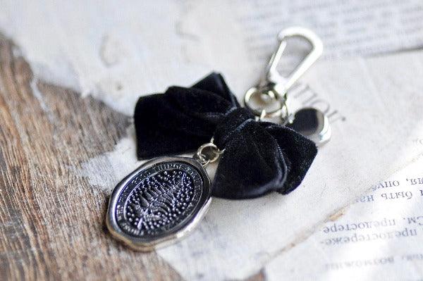 Message Wax Seal Charm Keychain Black Bow & Heart | Fern | Patience | S - Backtozero B20 - black bow, botanic, Botanical, bow, charm, Come to those who wait, enamel, enamel keychain, fern, Good things take time, Heart, her, keychain, lapel, metal, Nature, newarrivals, Plant, plants, ribbon, silver, soft enamel, starry, velvet, wax seal