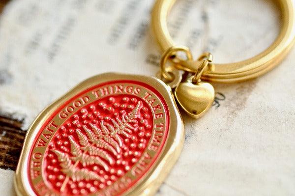 Message Wax Seal Keychain | Fern | Patience - Backtozero B20 - botanic, Botanical, Come to those who wait, enamel, enamel keychain, fern, Good things take time, heart, her, keychain, lapel, metal, Nature, newarrivals, Plant, plants, Red, soft enamel, starry, wax seal