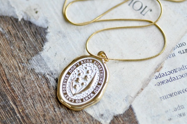 Message Wax Seal Enamel Necklace | Lily of the Valley | Gold - Backtozero B20 - botanic, Botanical, Come to those who wait, enamel, Flower, Gold, her, lapel, lily of the valley, metal, Nature, necklace, Plant, plants, soft enamel, starry, wax seal