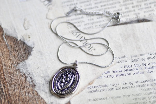Message Wax Seal Enamel Necklace | Lily of the Valley | Silver - Backtozero B20 - botanic, Botanical, Come to those who wait, enamel, Flower, her, lapel, lily of the valley, metal, Nature, necklace, Plant, plants, Silver, soft enamel, starry, wax seal