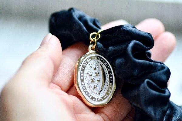 Message Enamel Wax Seal Charm Scrunchie | Satin S Black | Lily of the Valley - Backtozero B20 - accessory, Black, botanic, Botanical, enamel, Flower, Gold, hair, her, lapel, lily of the valley, metal, Nature, satin, scrunchie, soft enamel, starry, wax seal