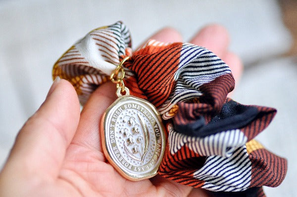Message Enamel Wax Seal Charm Scrunchie |Orange Plaid | Lily of the Valley - Backtozero B20 - accessory, botanic, Botanical, Brown, enamel, flower, hair, her, lapel, lily of the valley, metal, Orange, plaid, Plant, plants, scrunchie, soft enamel, starry, wax seal, White, Yellow